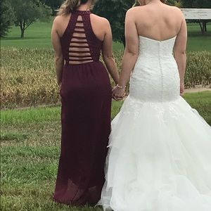 Burgundy David’s bridal dress